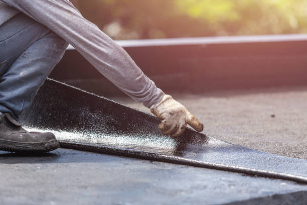 Professional Waterproofing technician working in Petersburg, IN